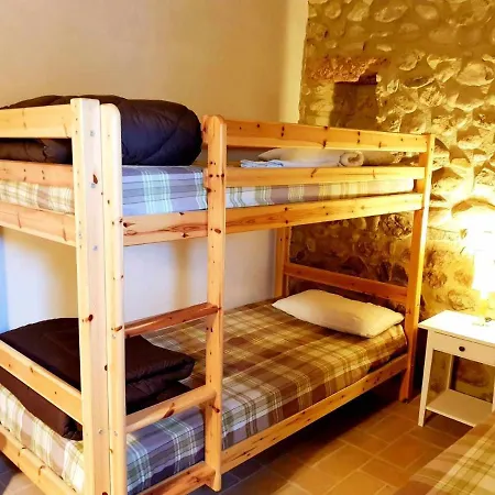 Дерев'яний котедж Masia Grupos Con Piscina Privada-28 Pax Cabanelles